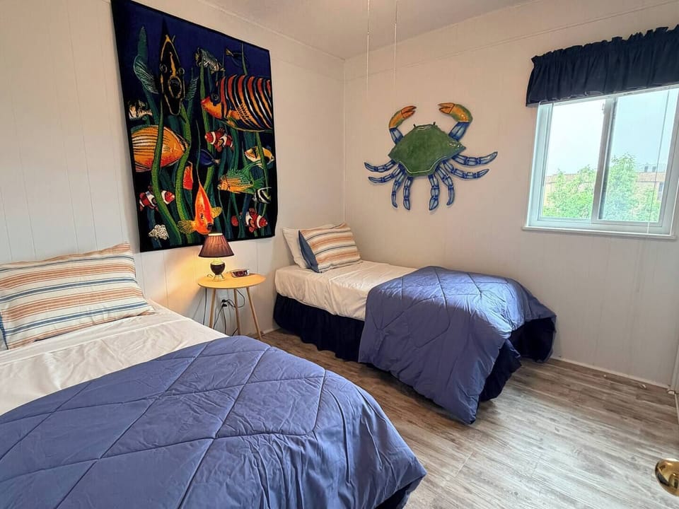 Colorful Second bedroom with two twins