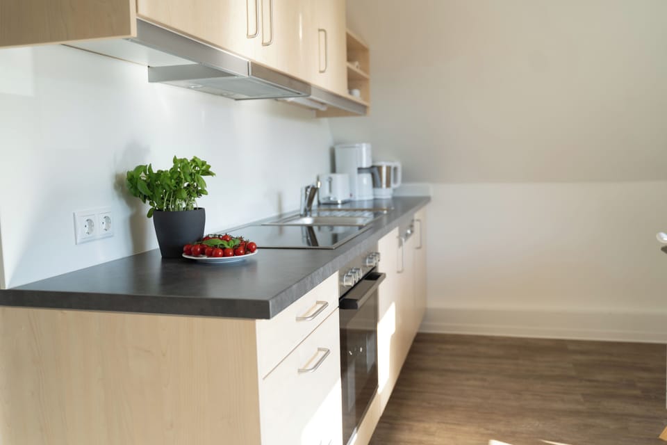 Superior Condo, 1 King Bed with Sofa bed, Kitchen, Garden View | Private kitchen | Electric kettle, highchair