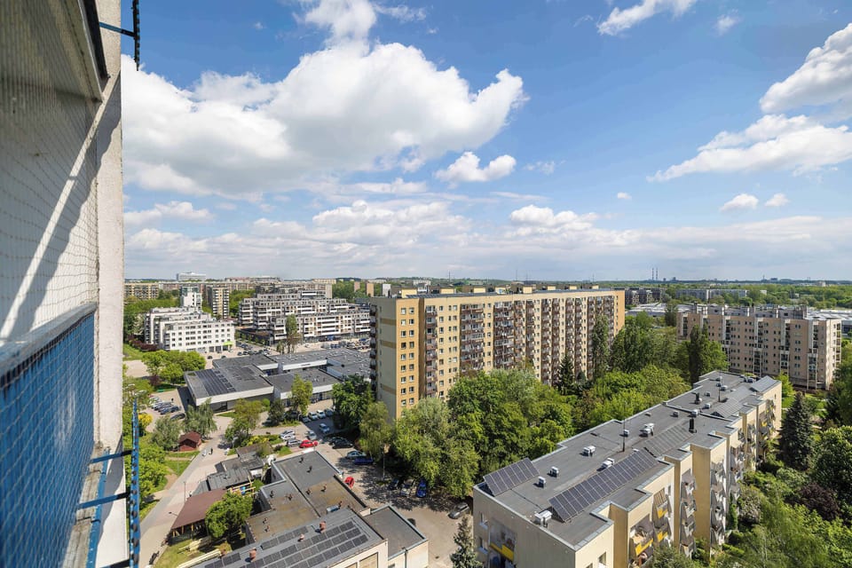 Sunny cityscape view with modern apartment buildings
