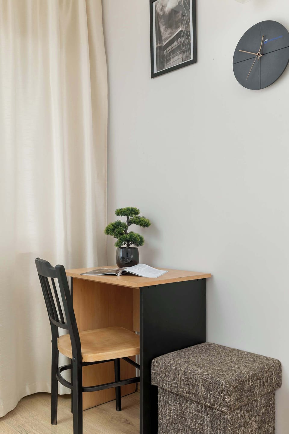 Minimalist workspace corner with desk