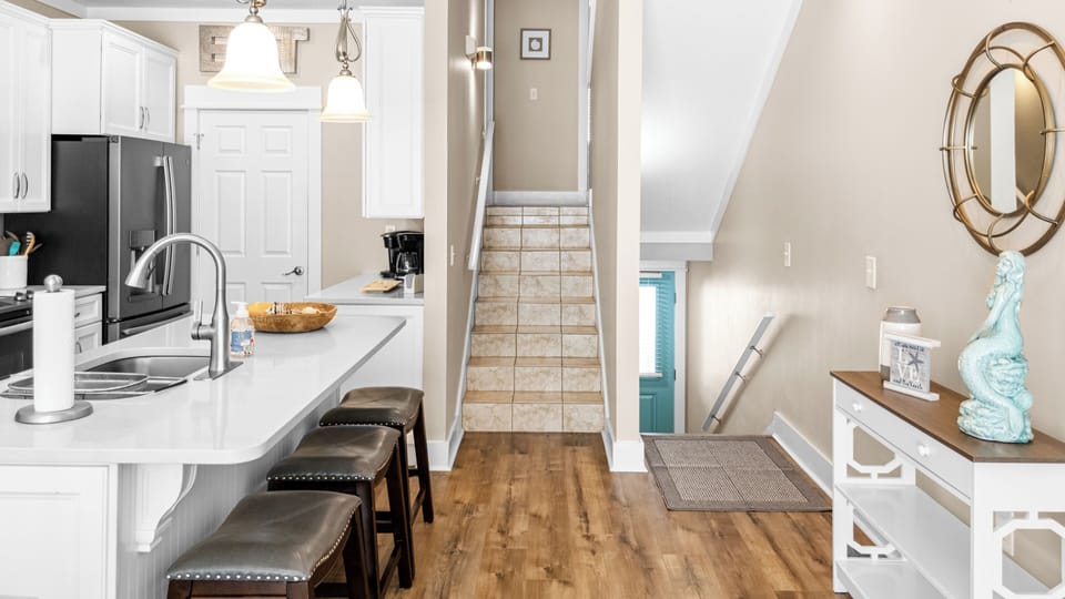 Front Door and steps to bedrooms 