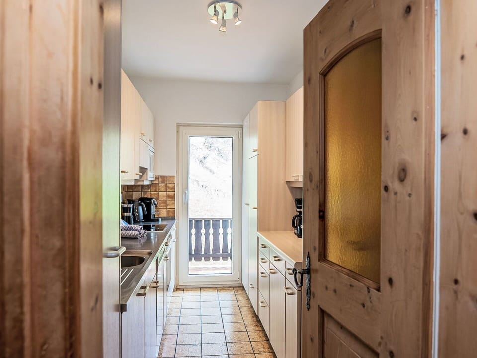 Countertop, Kitchen, Interior Design, Wood, Flooring, Ceiling, Cabinetry, Floor, Furniture, Room