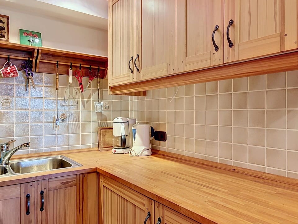 Flooring, Wood, Cabinetry, Kitchen, Countertop, Interior Design, Floor, Plumbing Fixture, Drawer, Cupboard