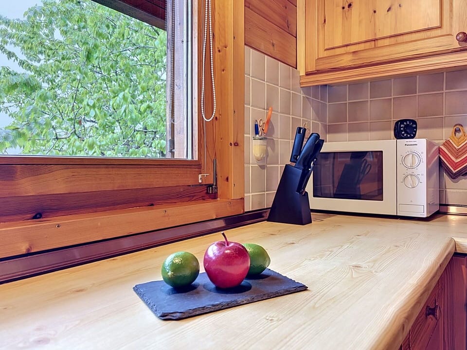 Wood, Flooring, Kitchen, Interior Design, Countertop, Wood Stain, Kitchen Appliance, Floor, Hardwood, Cabinetry