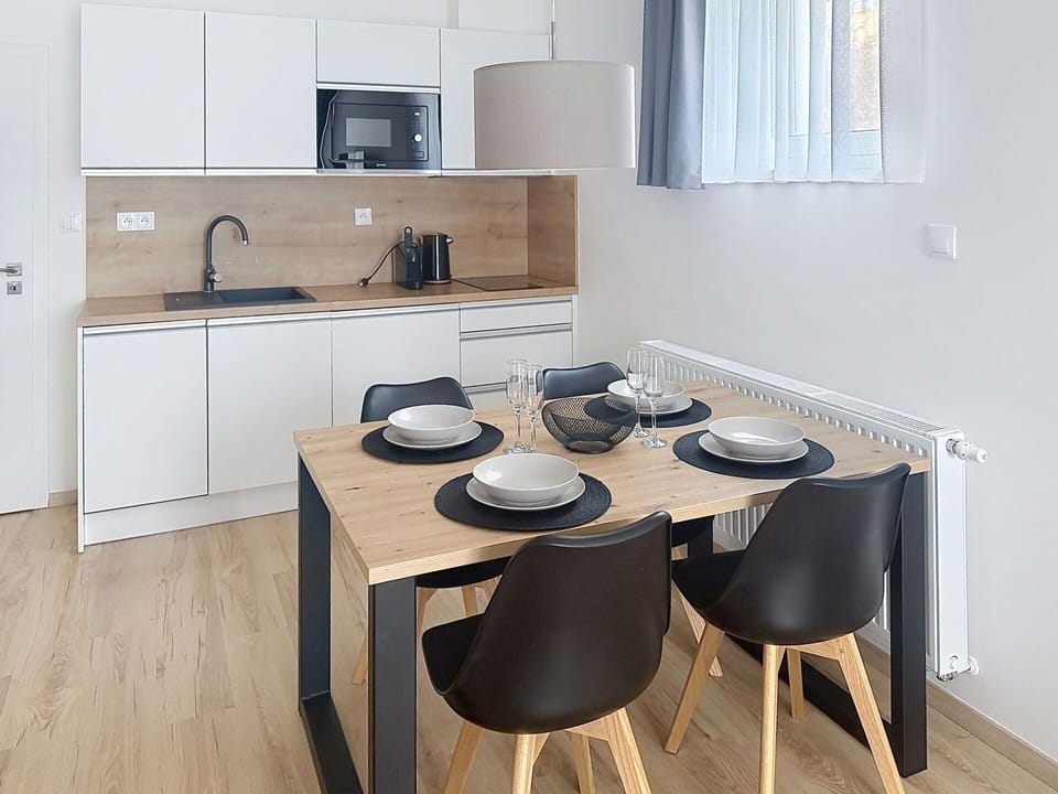 Furniture, Interior Design, Flooring, Wood, Floor, Room, Lighting, Countertop, Ceiling, Home