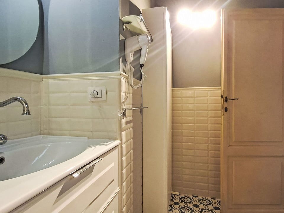 Wall, Flooring, Floor, Plumbing Fixture, Interior Design, Bathroom, Plumbing, Tap, Tile, Room