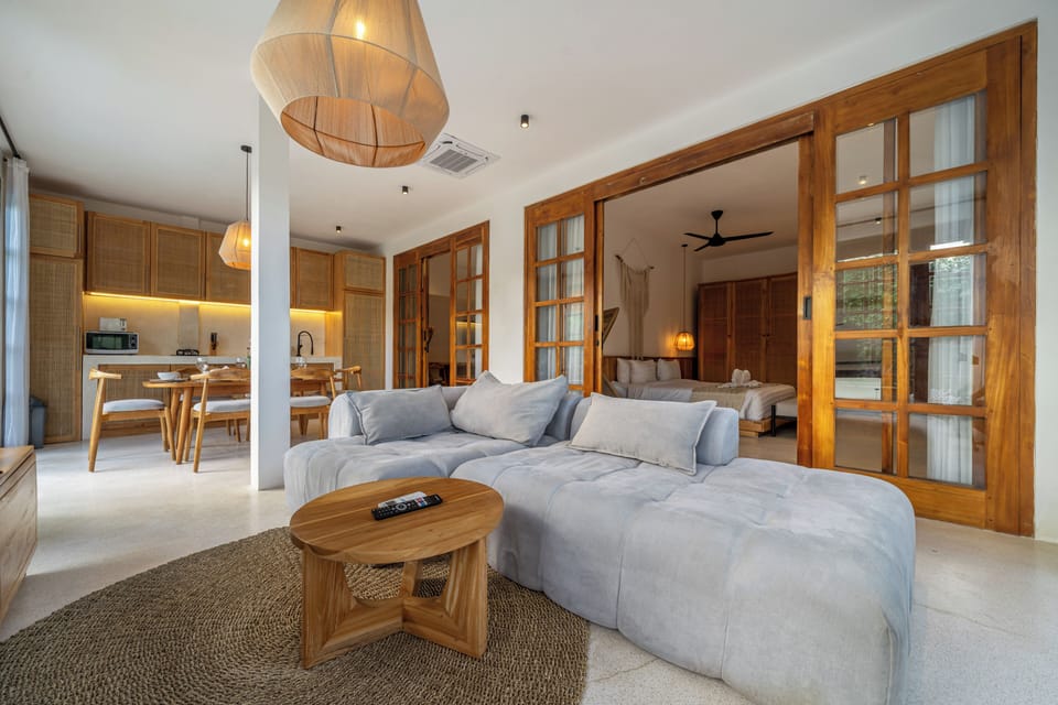 Panoramic Villa, Pool View | Living area | 50-inch Smart TV with digital channels