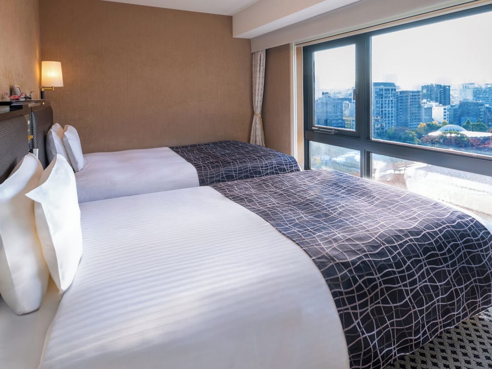 Deluxe Twin Room, 2 Bedrooms | Down comforters, desk, laptop workspace, soundproofing