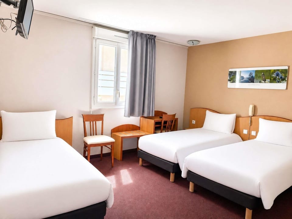 Premium bedding, desk, iron/ironing board, rollaway beds