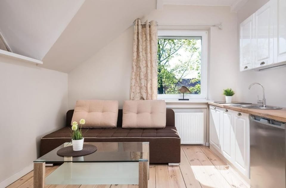 Classic Apartment, Garden View | Living area | TV
