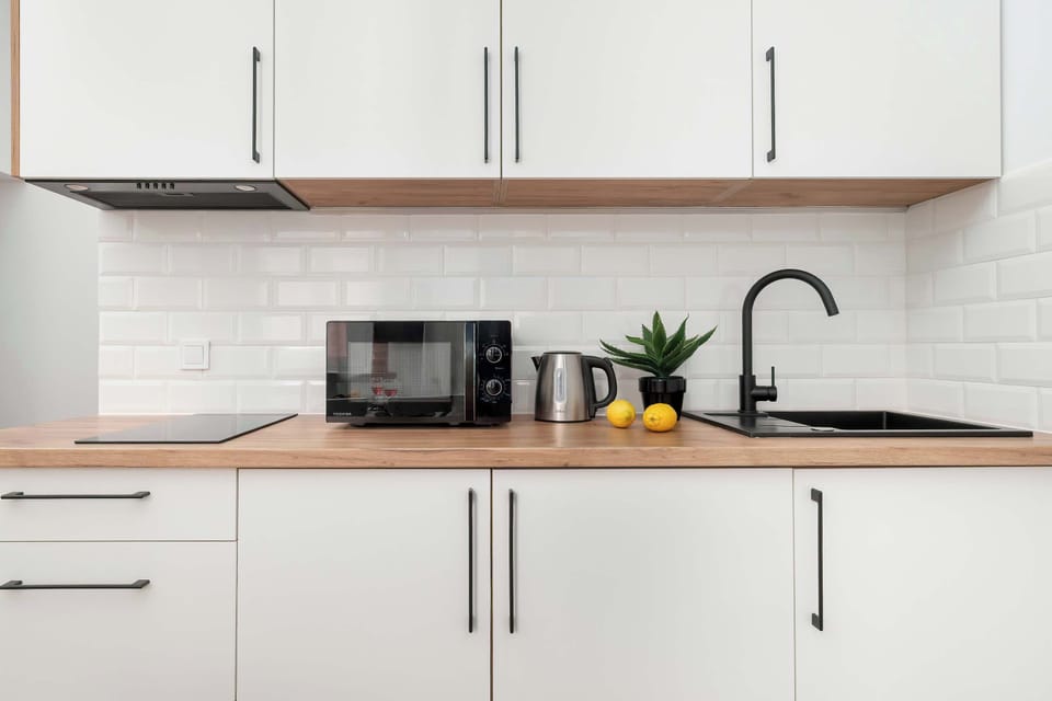 The kitchenette's practical layout maximizes space and functionality.
