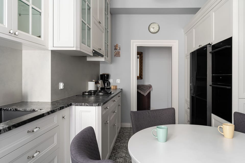 Apartment, Balcony, City View | Private kitchen | Coffee/tea maker, electric kettle, highchair, freezer