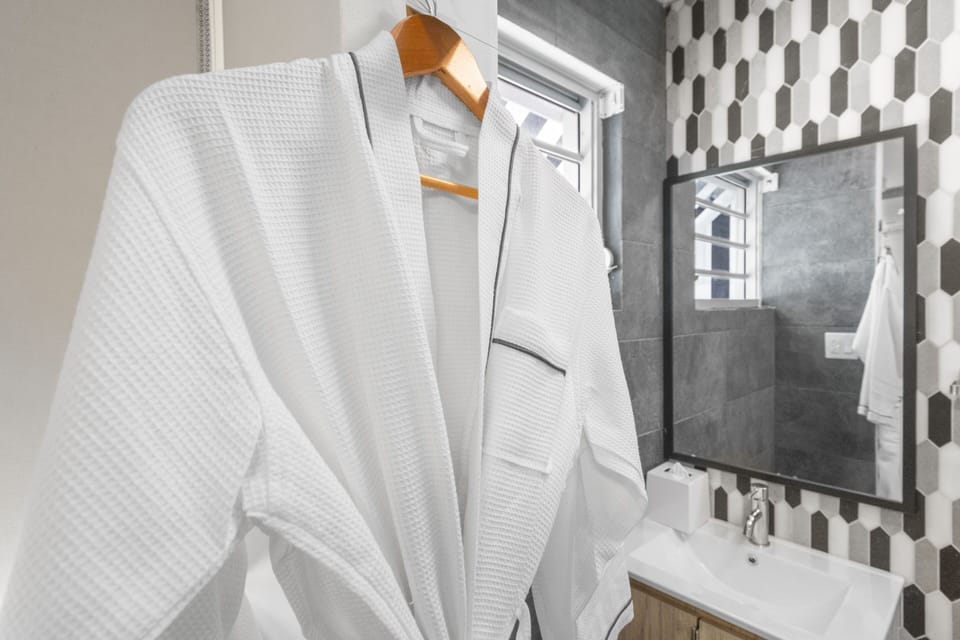 Standard Room | Bathroom | Shower, hair dryer, towels, soap