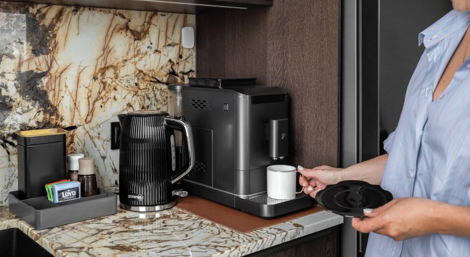 Deluxe Apartment, Non Smoking, Private Bathroom | Private kitchen | Coffee/tea maker, electric kettle, toaster, highchair