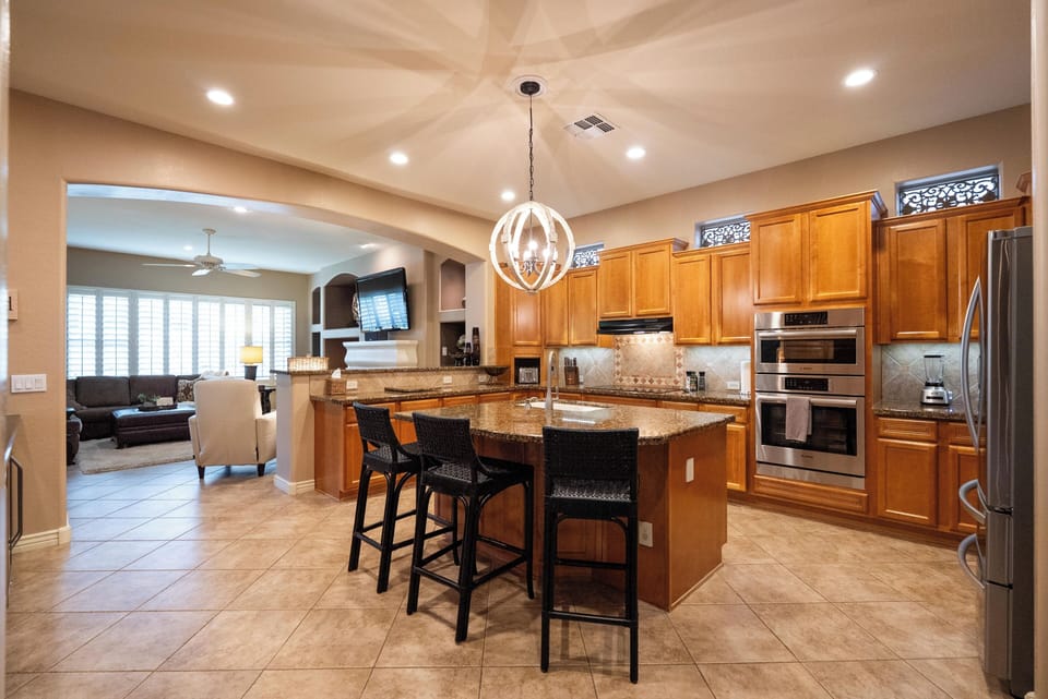 Gourmet kitchen with granite countertops and high end appliances