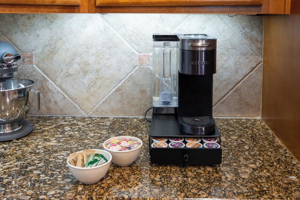 Complimentary Keurig station with K-cups, sugar and creamers