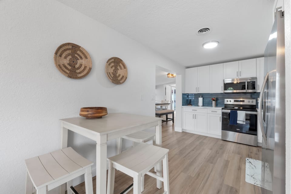 Cozy dining area with a simple, stylish setup.
