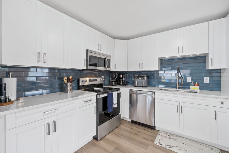 Step into this fully equipped kitchen, where you can cook your favorite meals.
