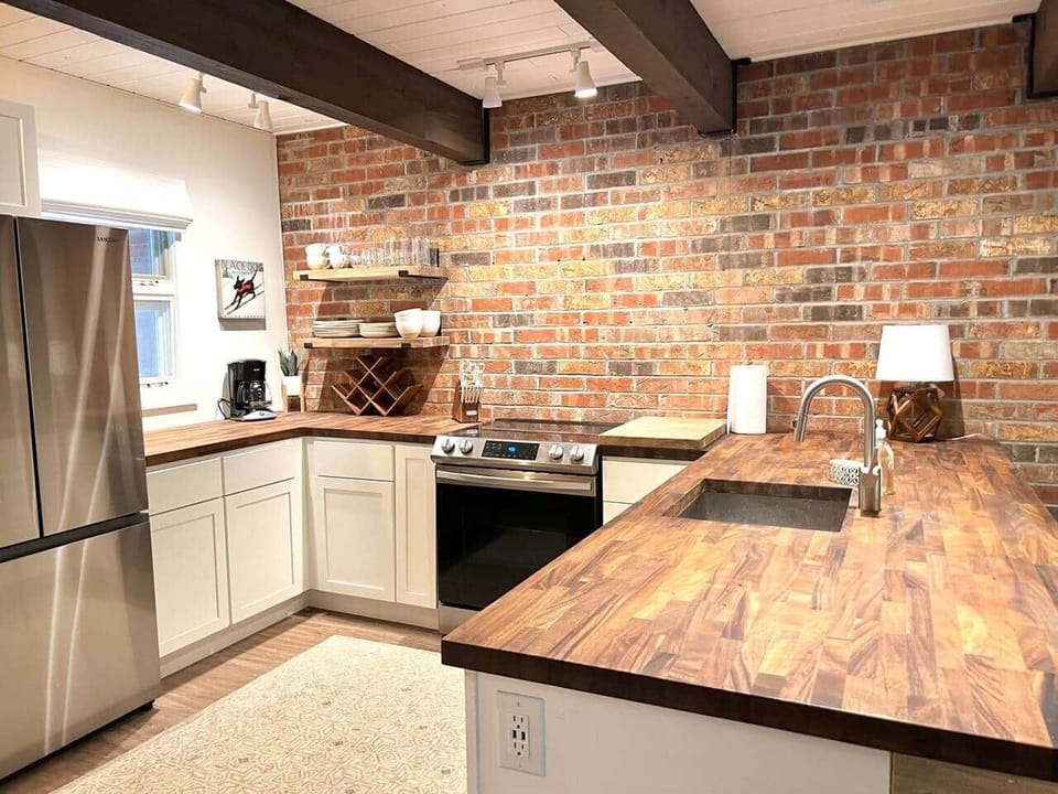 Kitchen is open and spacious enough for having plenty of meals at home. 