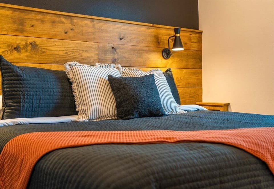 The second angle shows off the charming touches and layered textures that make this space feel warm and inviting.