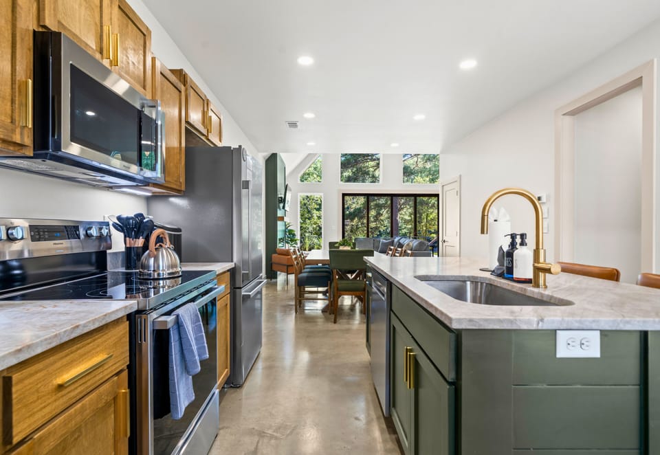 Modern appliances, warm wood tones, and a layout that makes cooking feel fun and easy.