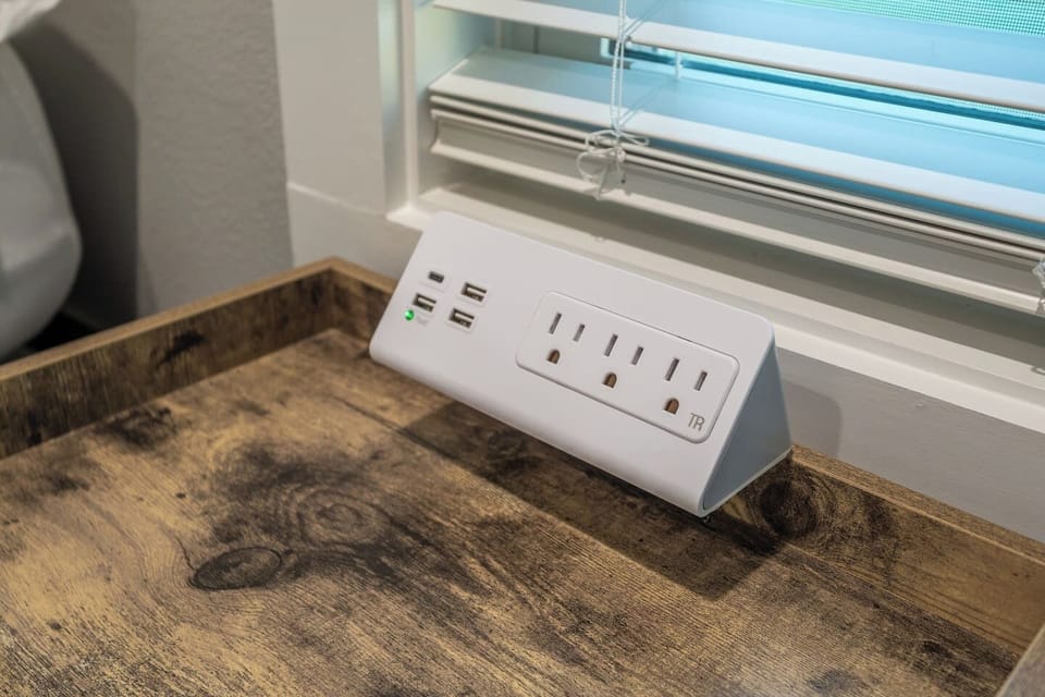 You won't have to hunt for an outlet at the Flamingo Flophouse!