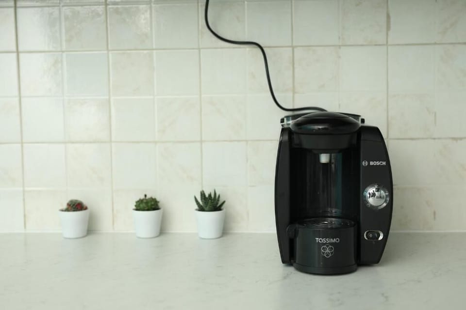 Apartment, Patio, Courtyard View | Coffee and/or coffee maker