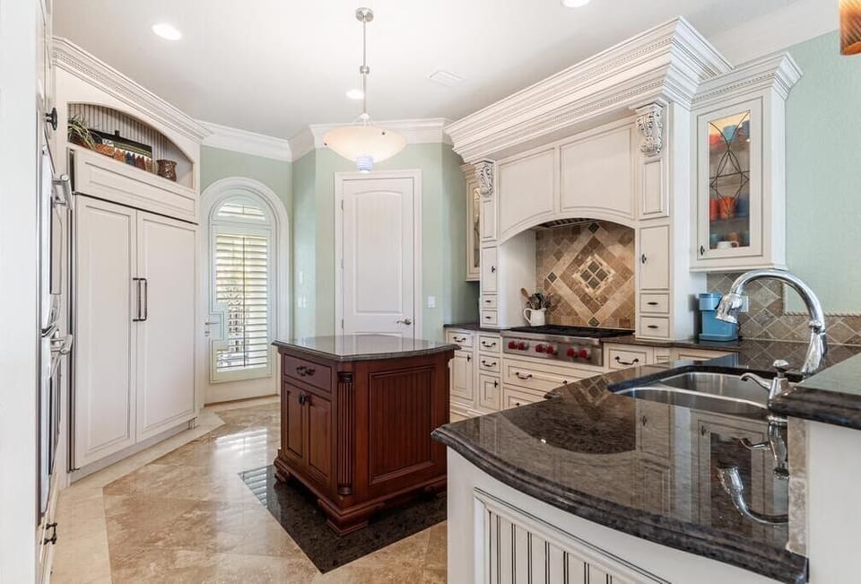 Gourmet Kitchen With Bar Seating On 2nd Floor