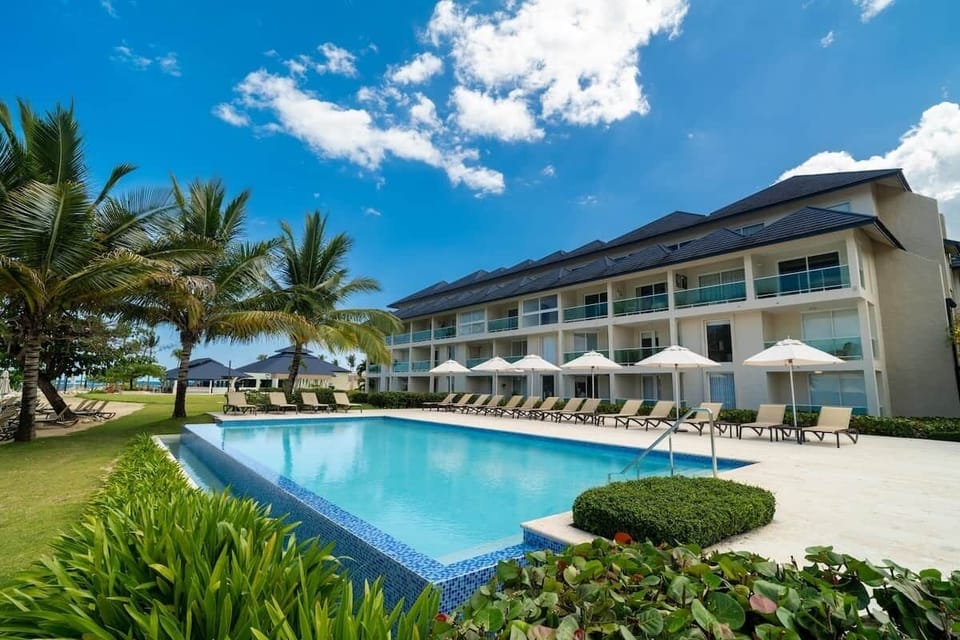 Relax in this inviting pool area, perfect for cooling off and enjoying sunny days. With ample seating and a tranquil ambiance, it’s an ideal spot for lounging, socializing, or simply soaking in the beauty of your vacation surroundings..