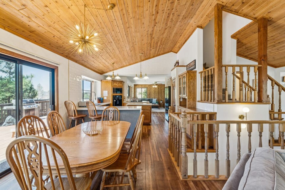Dining Area with Open-Concept Mountain Lodge Design
