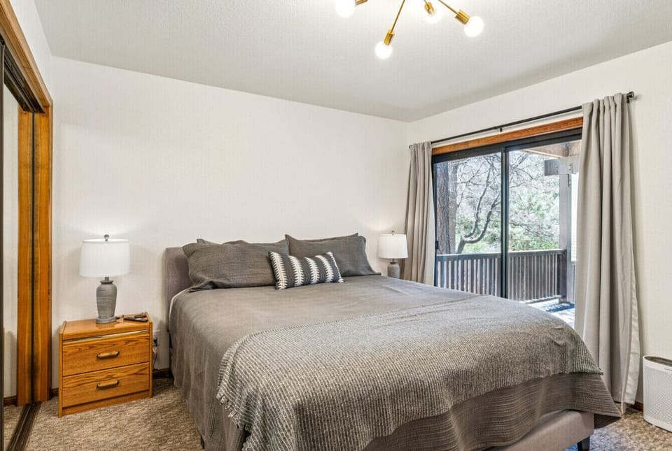 King Bedroom with Scenic Woodland Views