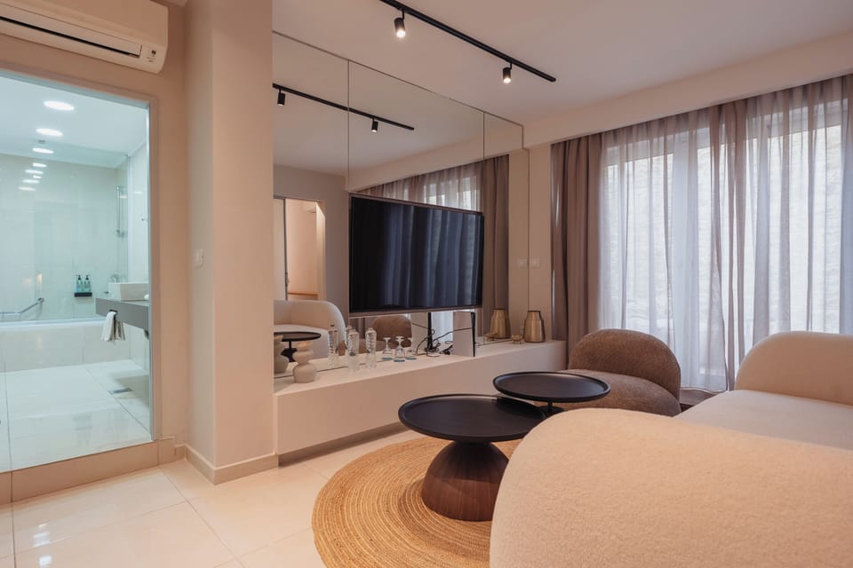 Grand Suite, 2 Bedrooms, Garden View (Family) | Minibar, in-room safe, individually decorated, individually furnished