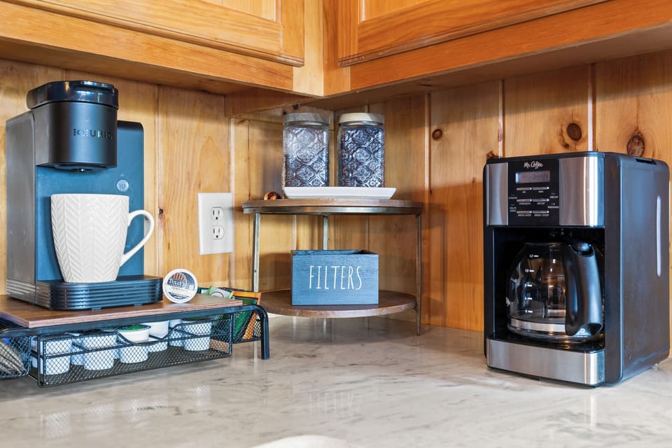 Wake up and smell the coffee at our fully stocked coffee bar! Enjoy your perfect brew—whether drip, Keurig, or French press—while taking in stunning views. The best way to start your day is with a great cup of coffee and beautiful scenery!