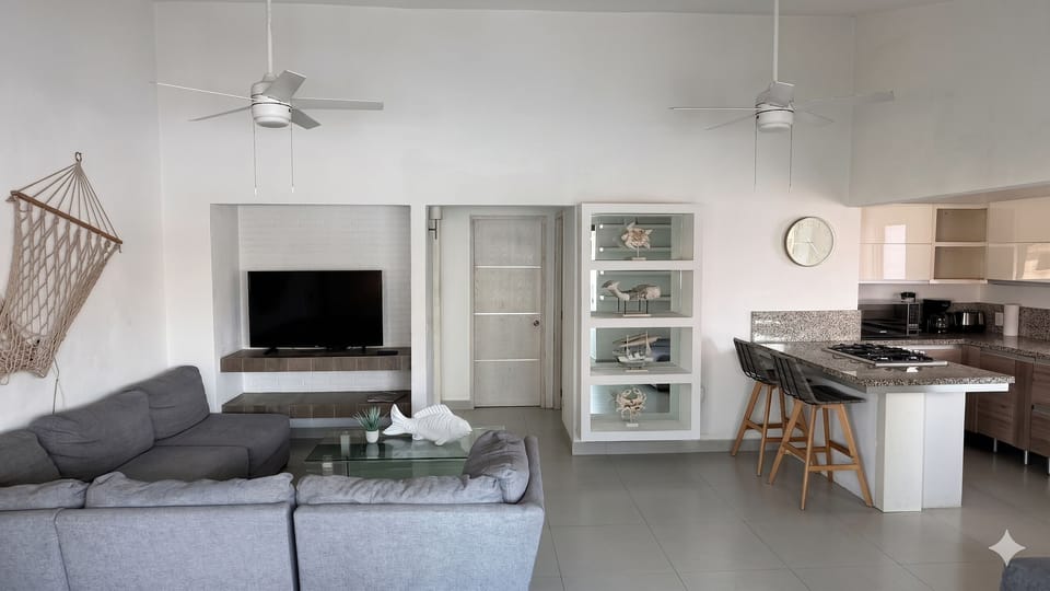 Family Apartment | Living area | 60-inch LED TV with cable channels