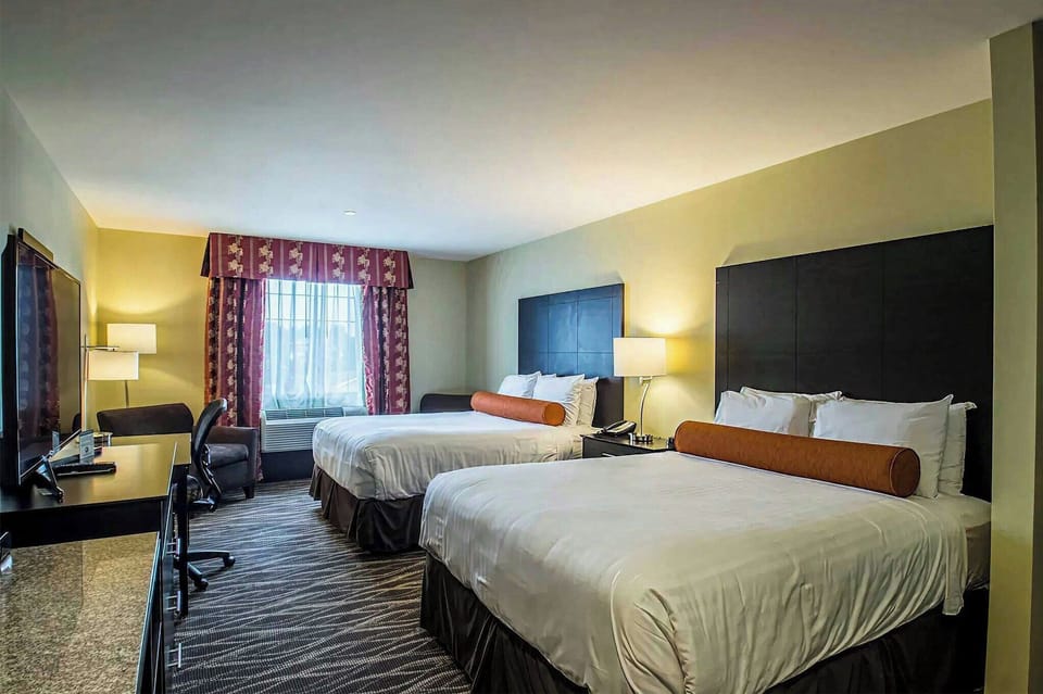 Premium bedding, pillowtop beds, desk, laptop workspace