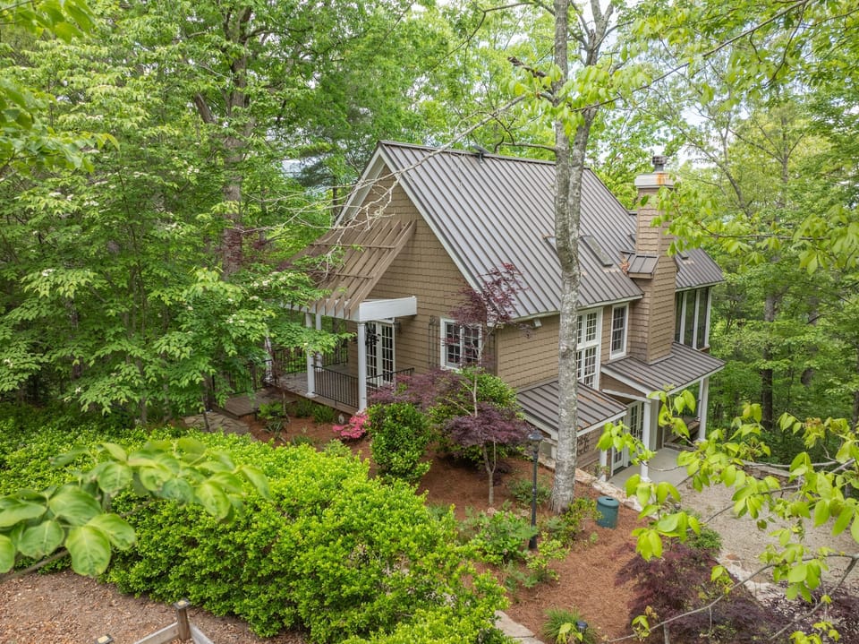Tucked into the mountainside, Cheoah Cottage welcomes you with peaceful surroundings, charming landscaping, and a true mountain getaway feel.