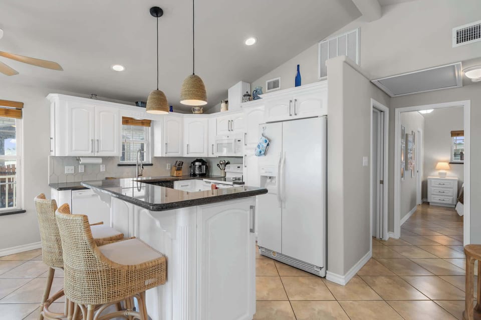 Cook with ease in the full kitchen with island seating