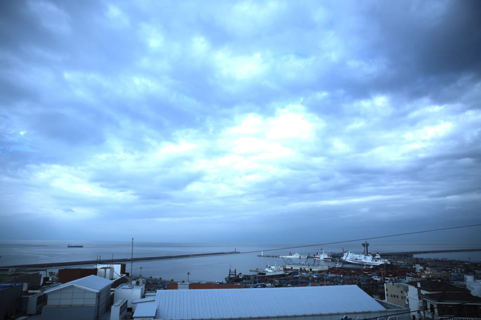 Deluxe Twin Room, Partial Ocean View | Blackout drapes, soundproofing, free WiFi