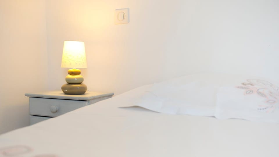 Premium bedding, memory foam beds, desk, laptop workspace