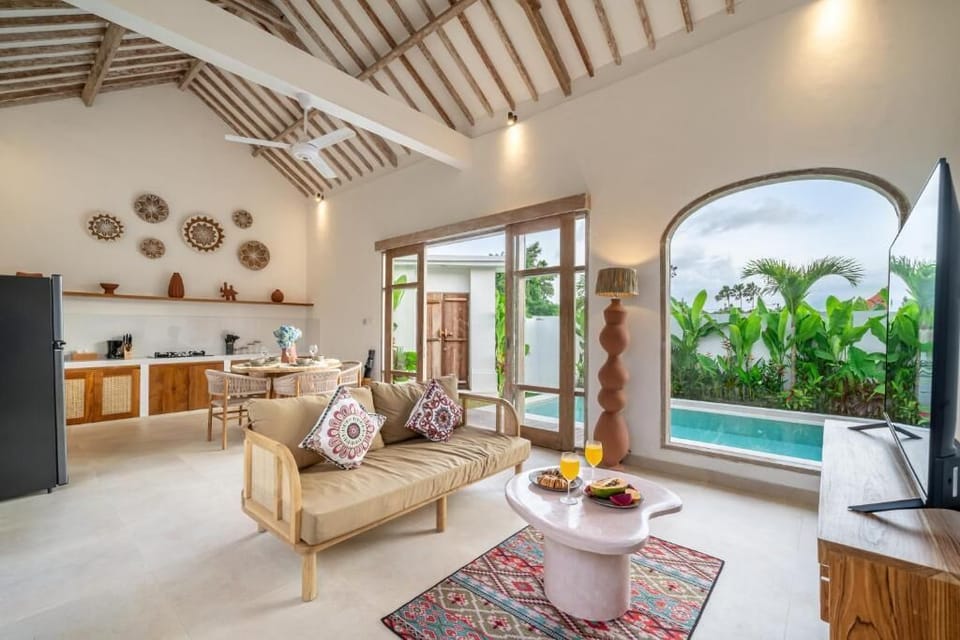 Deluxe Villa, 2 Bedrooms, Private Pool | Living area | 50-inch Smart TV with digital channels