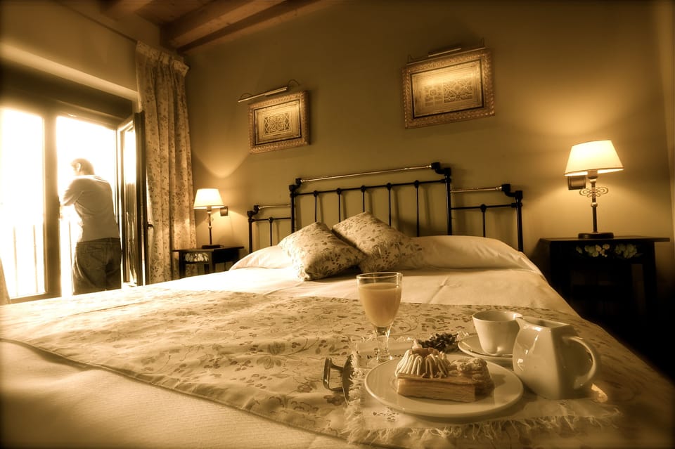 Premium bedding, desk, blackout drapes, soundproofing