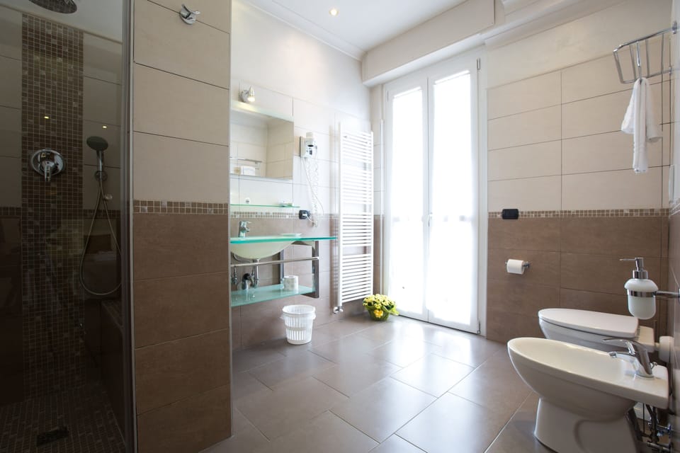 Shower, free toiletries, hair dryer, bathrobes