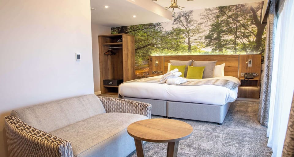 Junior Suite, 1 King Bed, Balcony, Garden View | In-room safe, individually decorated, iron/ironing board, free WiFi