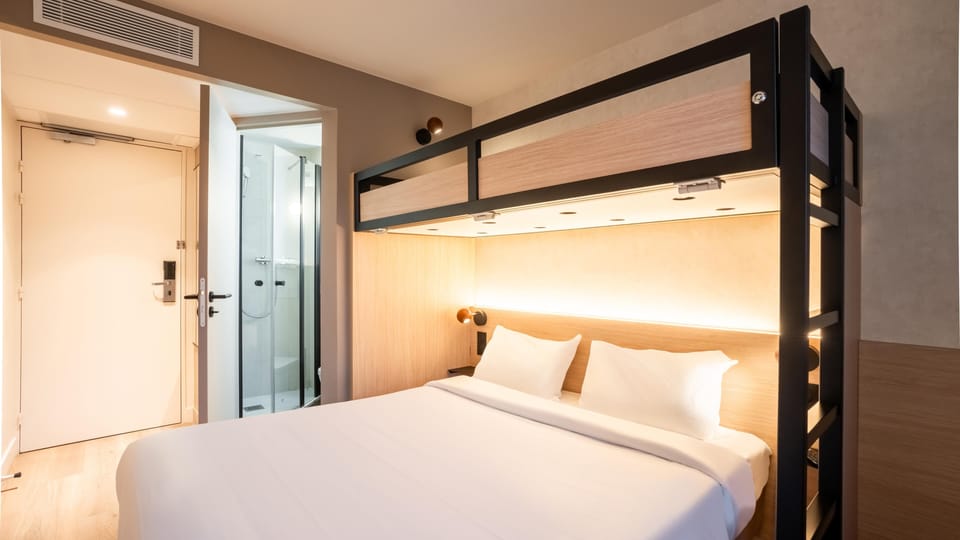 Premium bedding, desk, blackout drapes, soundproofing