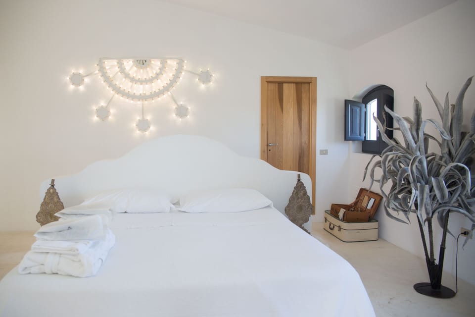 Suite | Premium bedding, minibar, in-room safe, blackout drapes