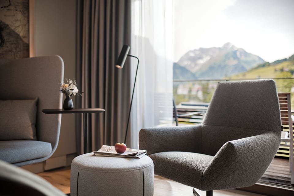 Superior Double Room, Balcony, Mountain View | Living area | 32-inch flat-screen TV with cable channels, TV, foosball