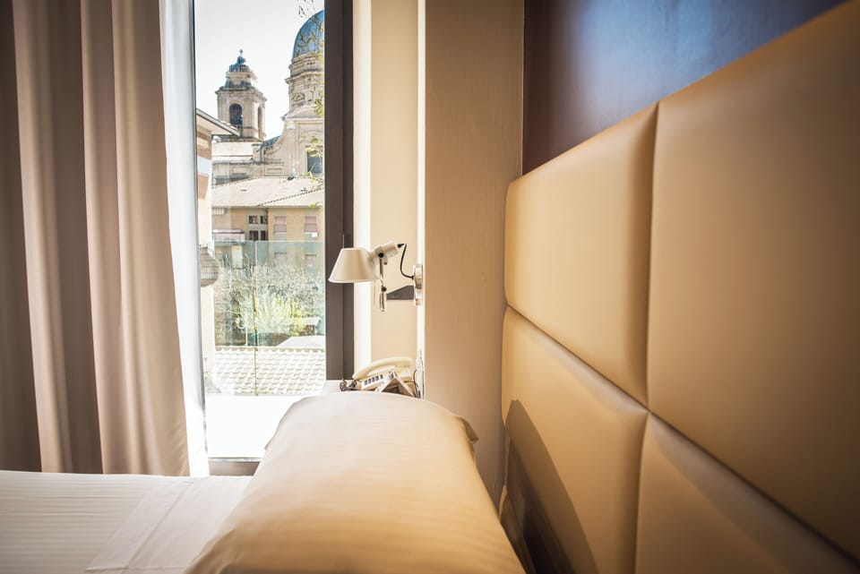 Standard Double or Twin Room | Down comforters, minibar, in-room safe, desk