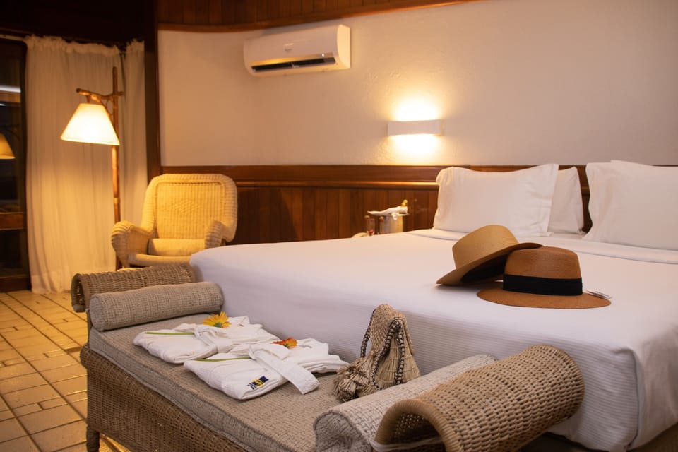 Bungalow - exclusive breakfast | Minibar, in-room safe, desk, blackout drapes