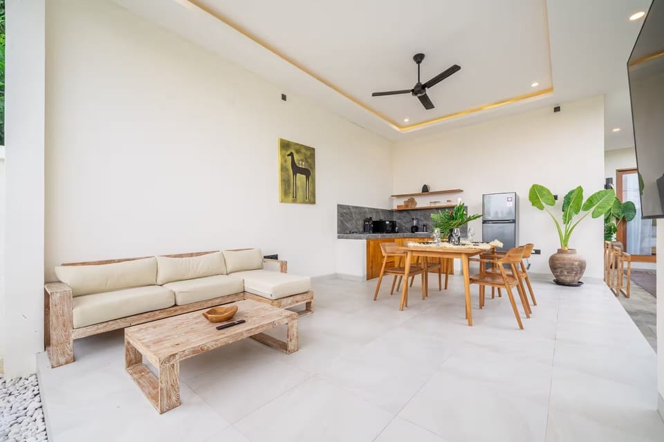 Deluxe Villa, 2 Bedrooms, Private Pool | Living area | 50-inch Smart TV with digital channels, video-game console