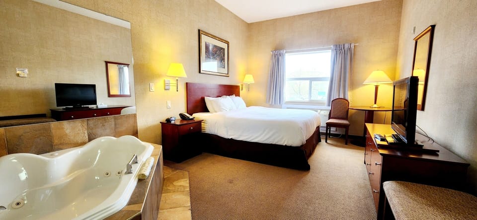 Deluxe Room, 1 King Bed | Desk, iron/ironing board, free WiFi, bed sheets
